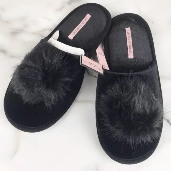 black slippers with pom pom